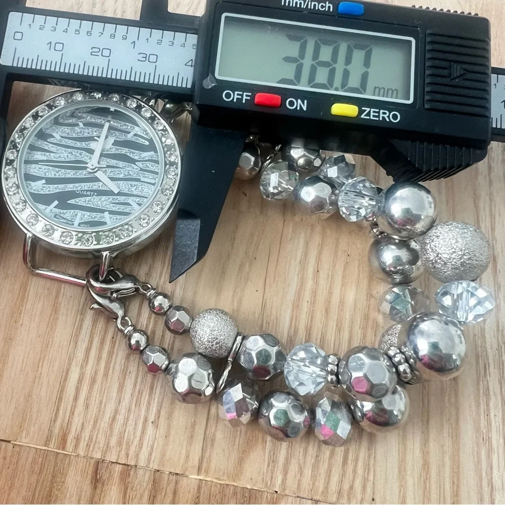 Unbranded ladies silver tone beaded bracelet watch NEW BATTERY